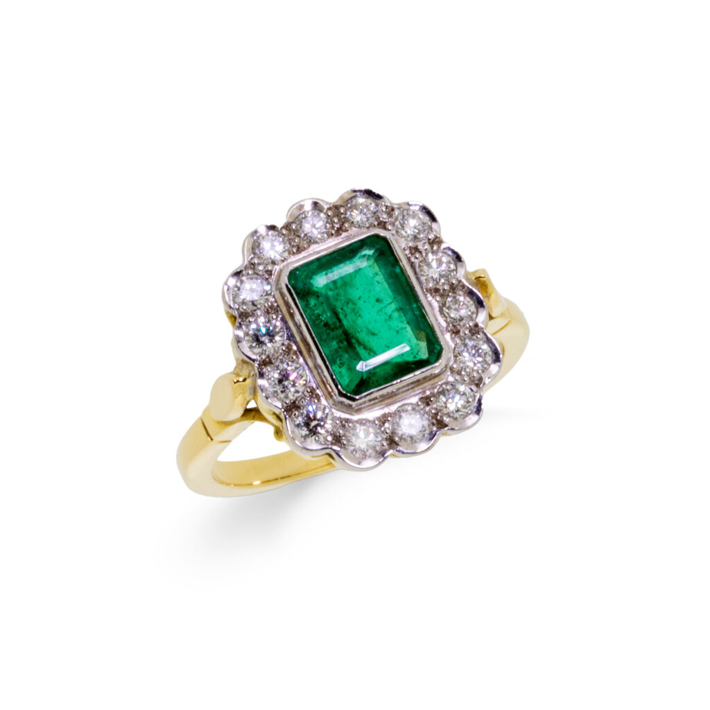 Emerald and diamond cluster ring Emerald and diamond cluster ring owen and jones hungerford