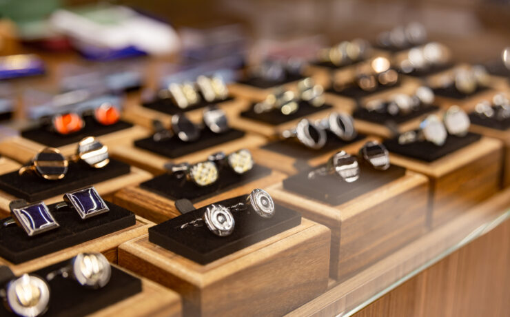 Selection of classic and modern men’s cufflinks from Owen & Jones in Hungerford, displayed in a luxury jewellery setting