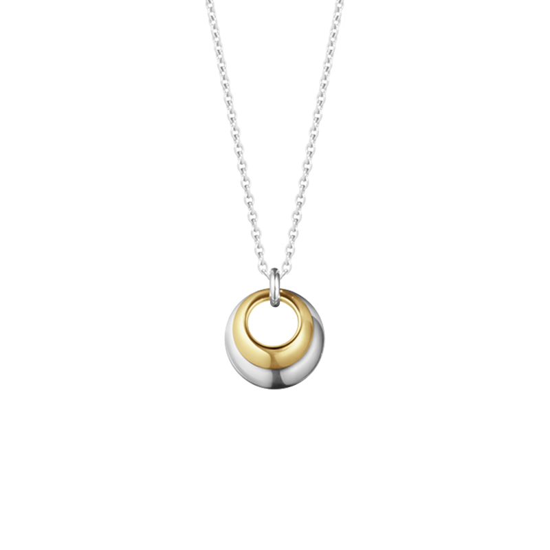 Silver and 18ct gold curve pendant by Georg Jensen at Owen & Jones